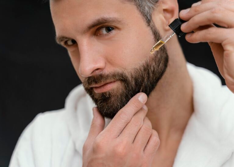 man using natural oils his face Barcode Fragrances